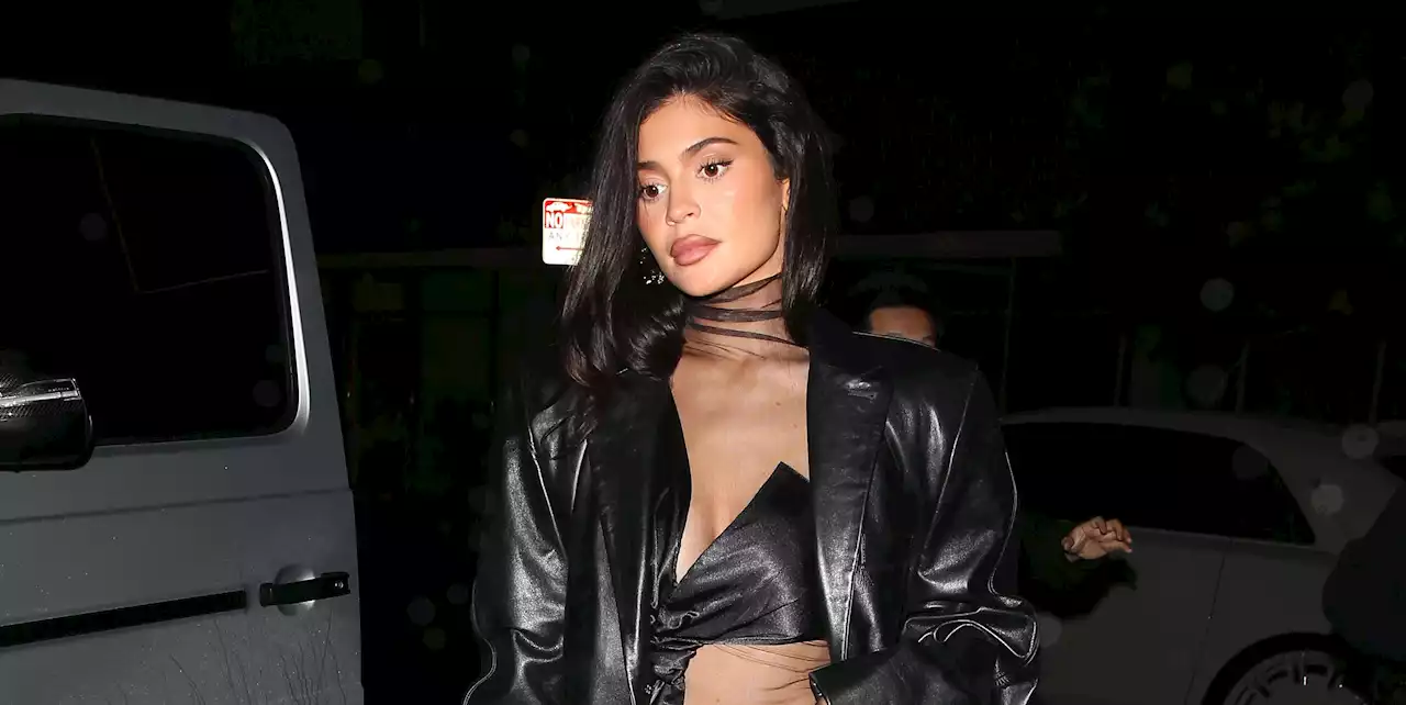 Kylie Jenner Wears Wears a Sheer and Satin Dress That Showed Off Her Toned Abs to Hollywood Party