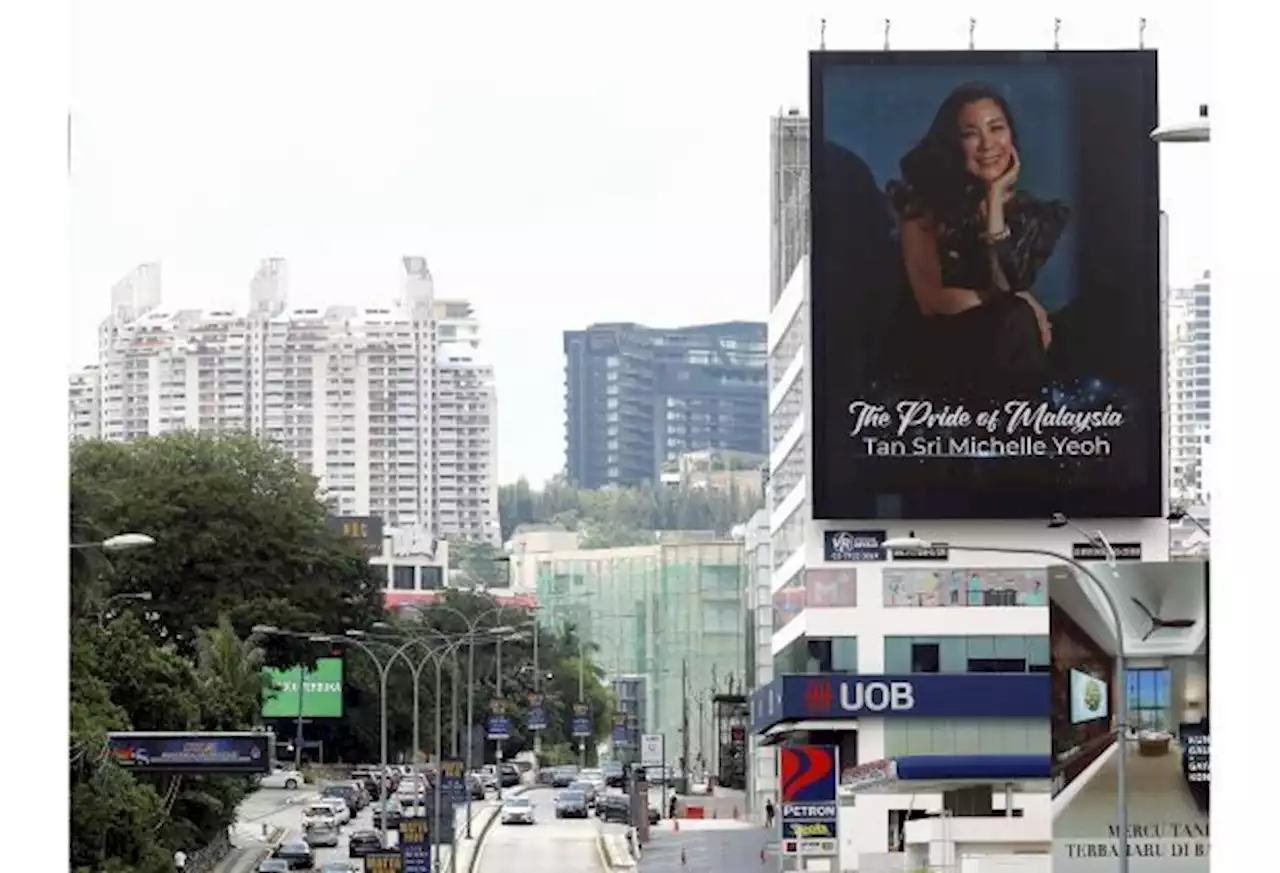 Malaysians cross their fingers and hope for Michelle Yeoh's success at the Oscars