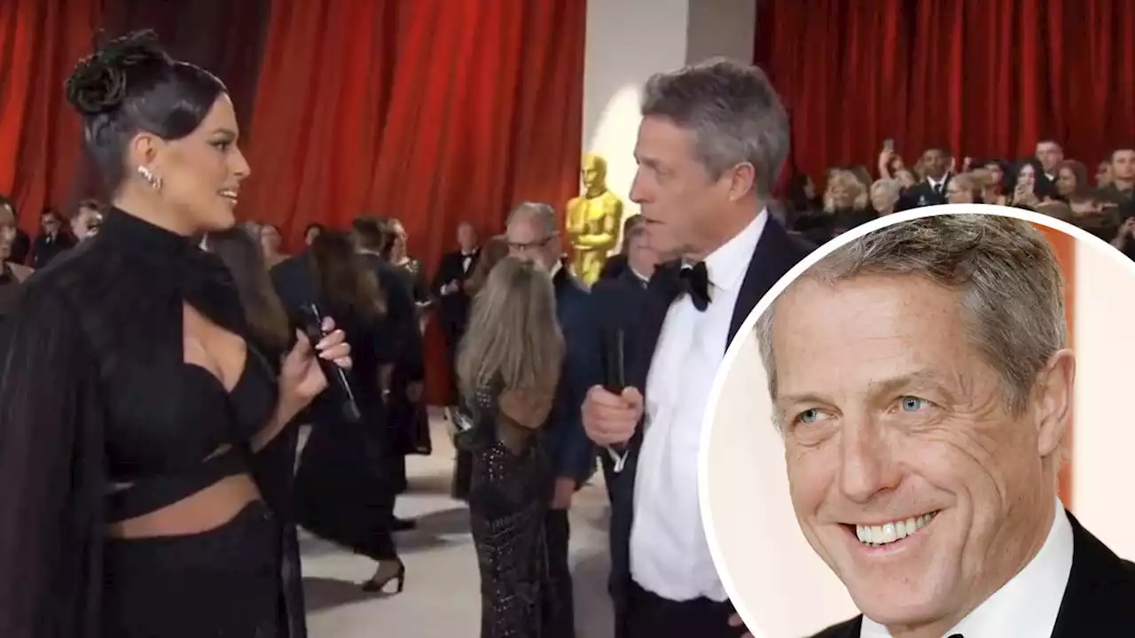 Hugh Grant shuts down Ashley Graham and rolls his eyes at her in awkward Oscars red carpet interview