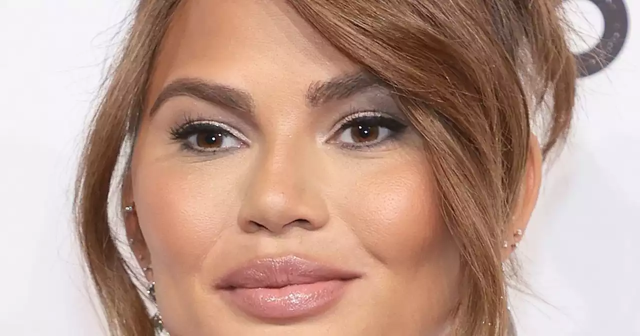 Chrissy Teigen shows off phase two of her dramatic red hair transformation