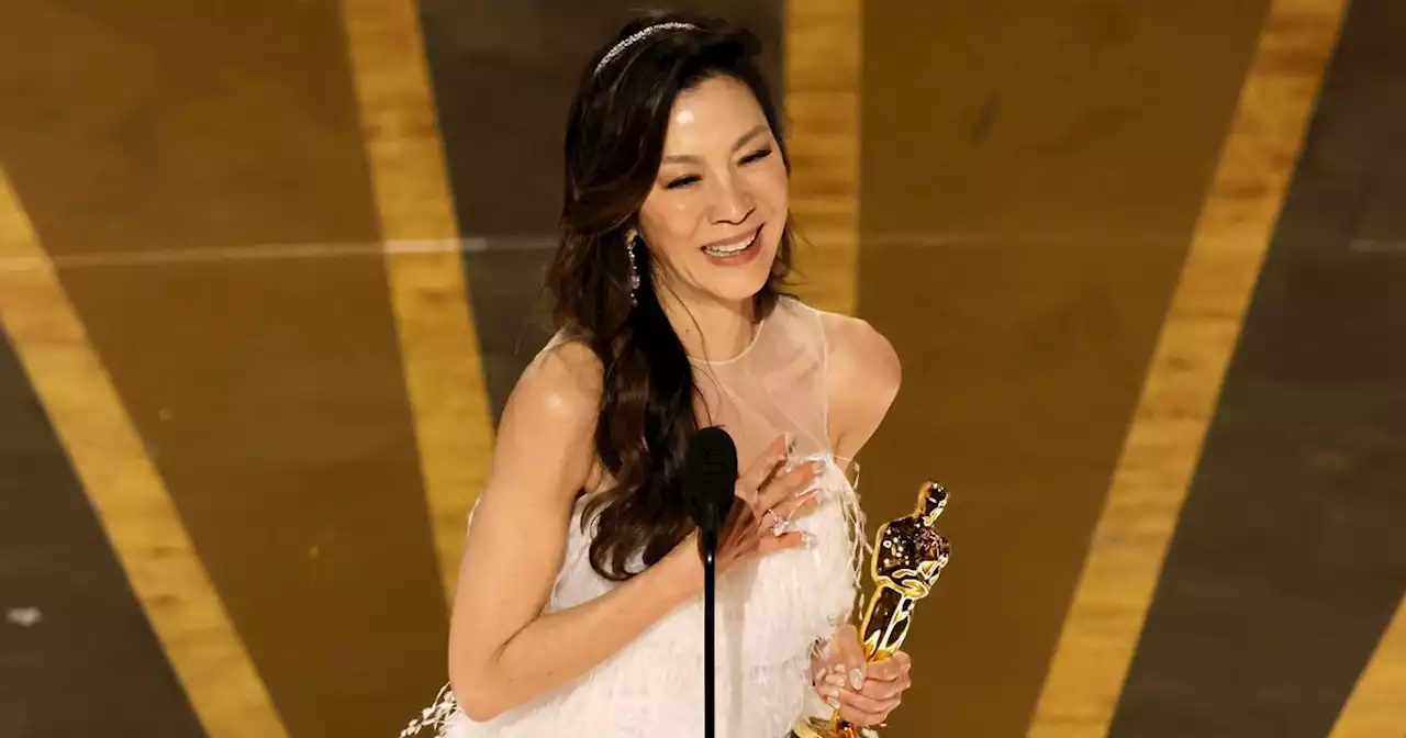 Michelle Yeoh says 'dreams to come true' as she makes Oscars history with win