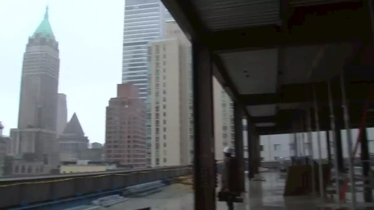 Mayor Eric Adams tours former office building being converted to housing in Lower Manhattan