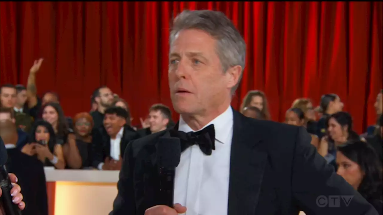 Hugh Grant Goes Viral For Incredibly Awkward Interview With Ashley Graham At The Oscars