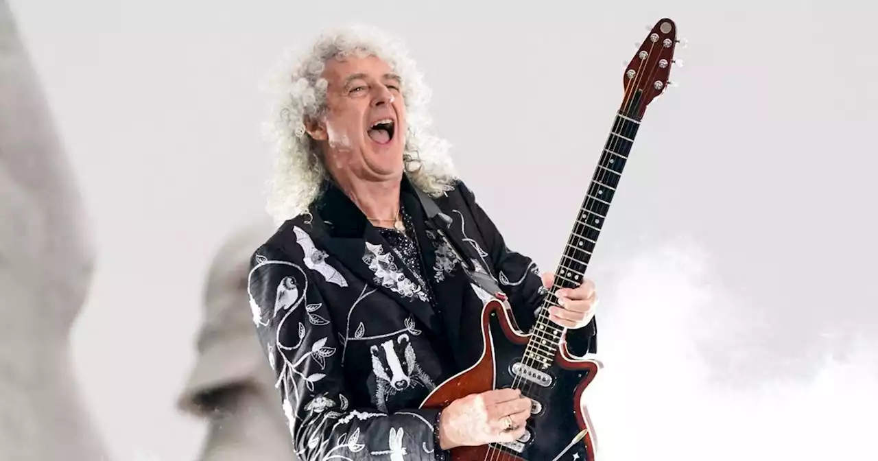 Queen guitarist Brian May among those receiving honours at Buckingham Palace