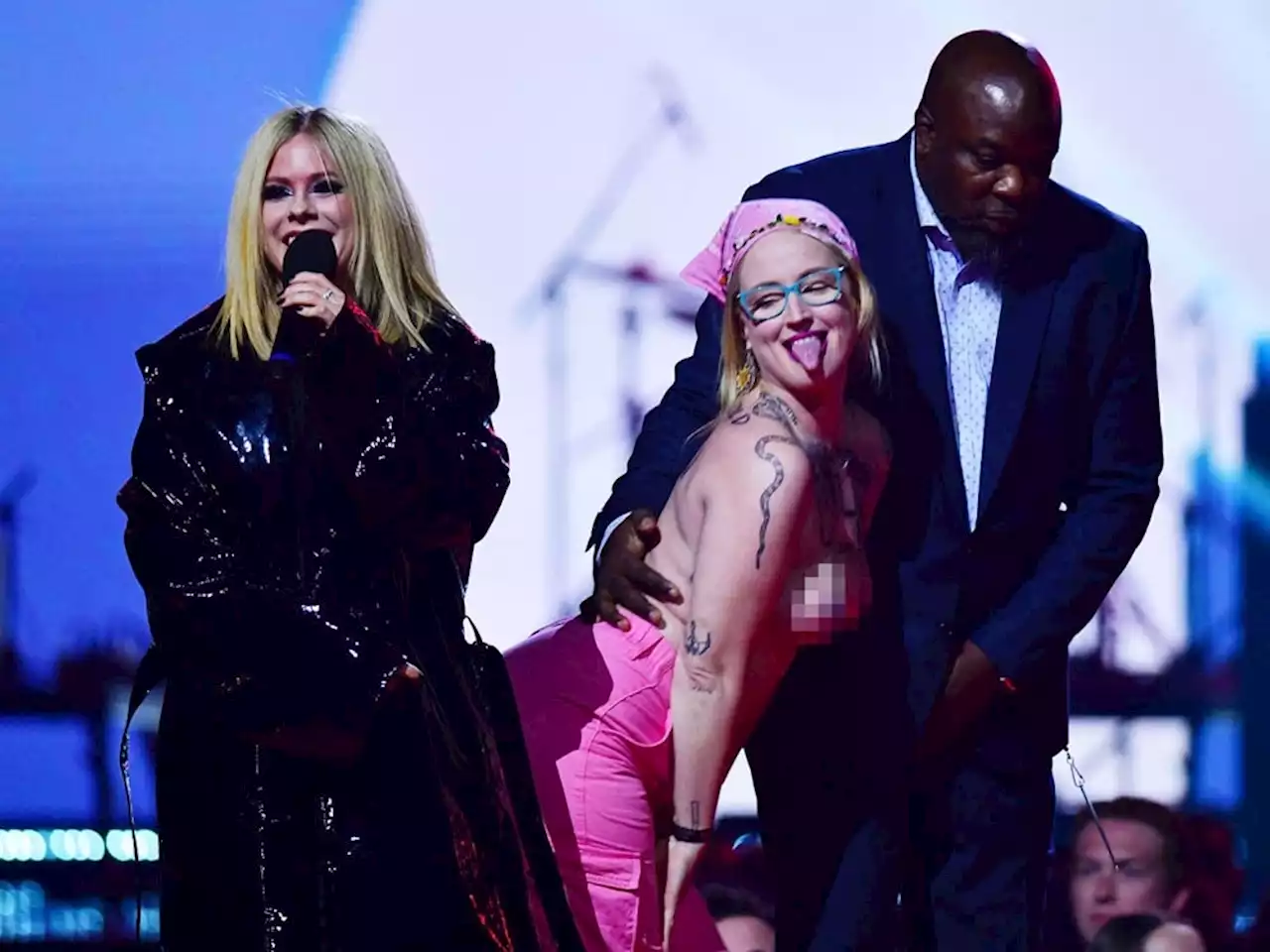 'GET THE F--- OFF': Avril Lavigne to topless woman protesting development of Ontario greenbelt on Juno stage