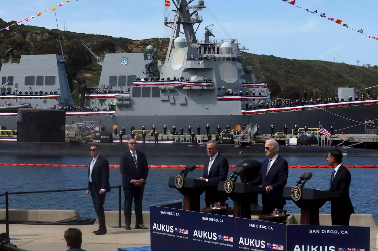 Eyeing China, Biden and allies unveil nuclear-powered submarine plan for Australia