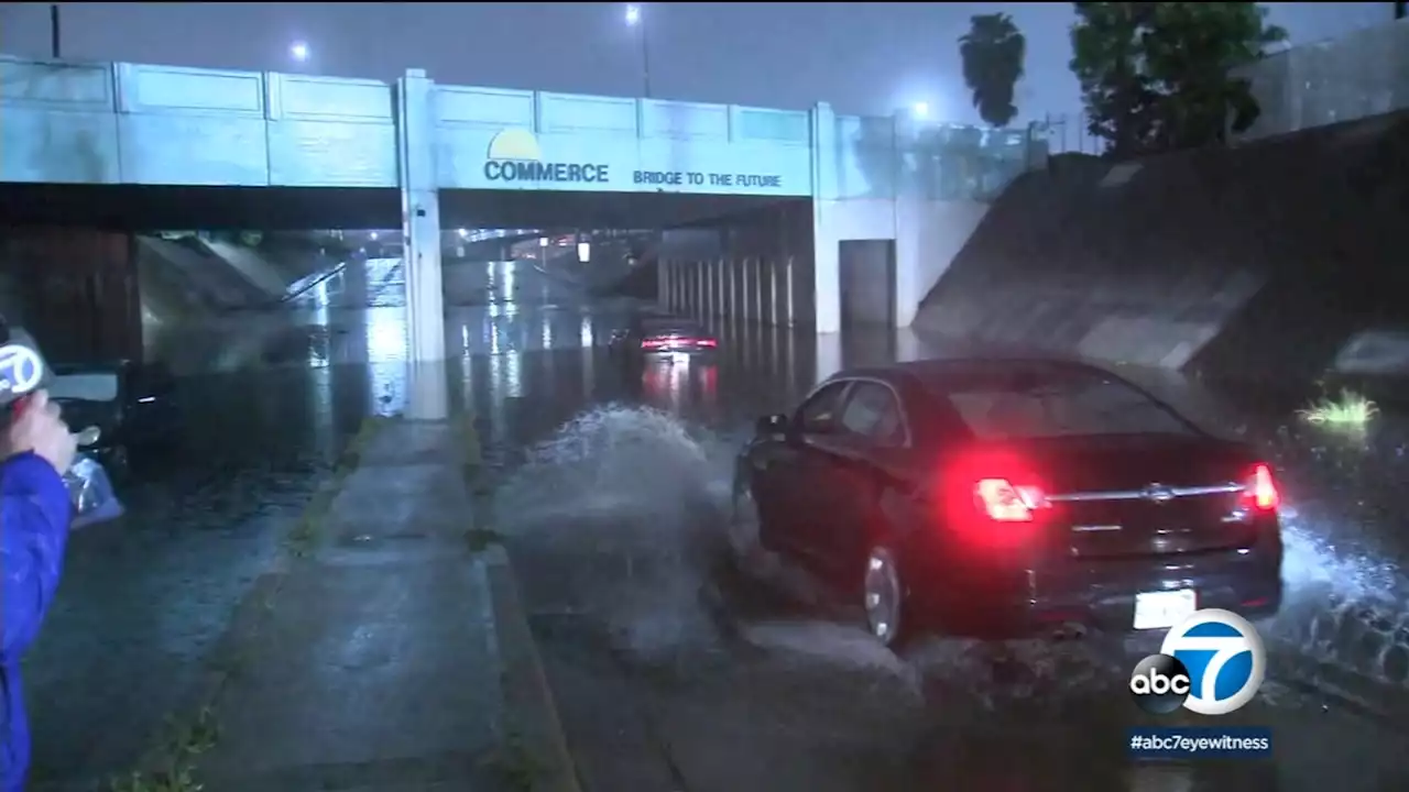 Several cars stranded after drivers attempt to drive through floodwater on street in Commerce