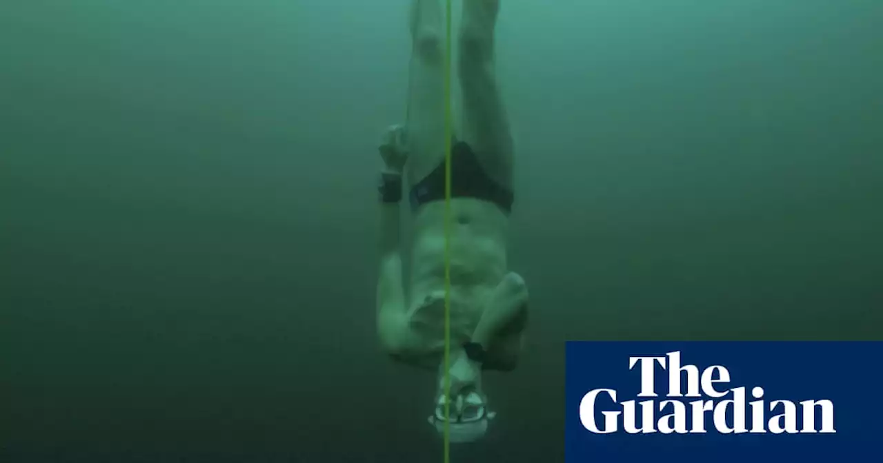 Czech free-diver David Vencl plunges to record depth beneath frozen Swiss lake