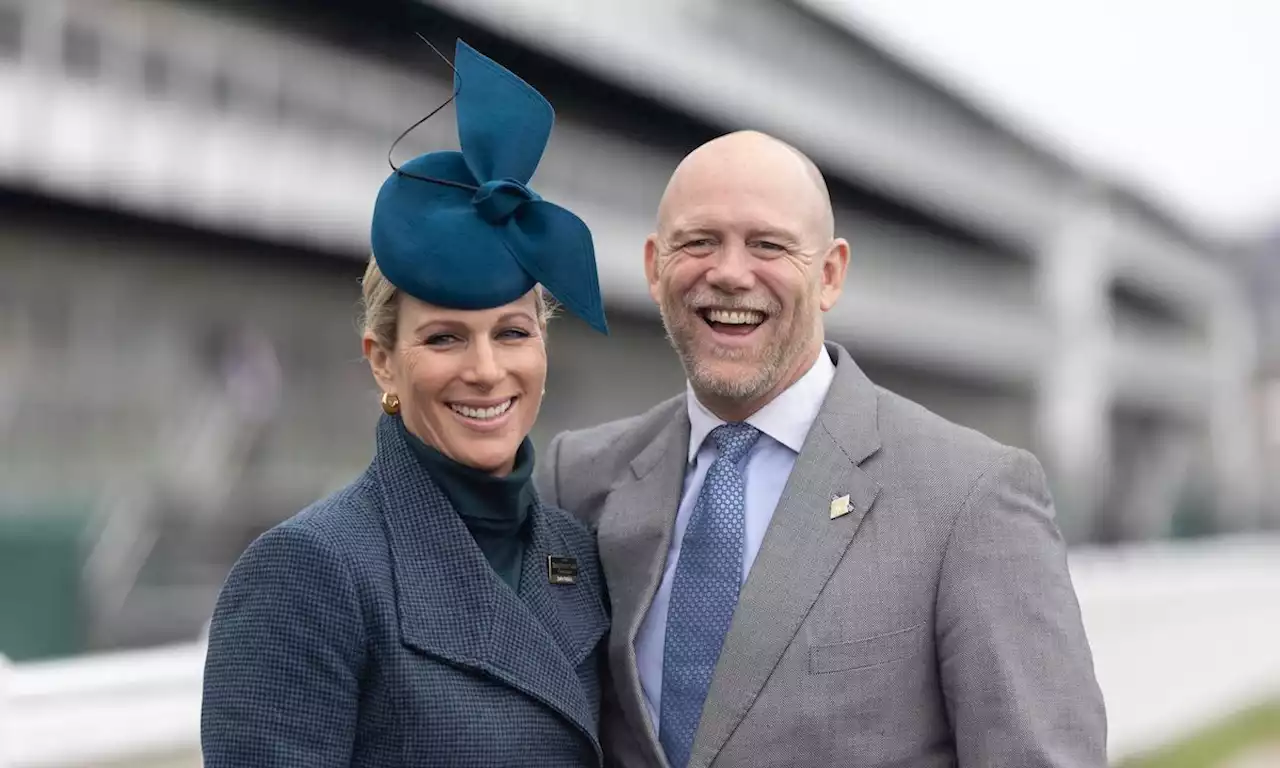 Zara Tindall wears statement blue hat in loved-up photos with Mike Tindall at Cheltenham Races