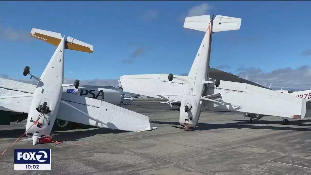 Strong winds take down trees, flip over planes in Concord