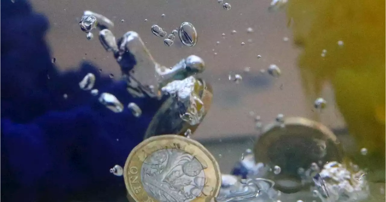 Pound tumbles against dollar on more bank woes, budget in view