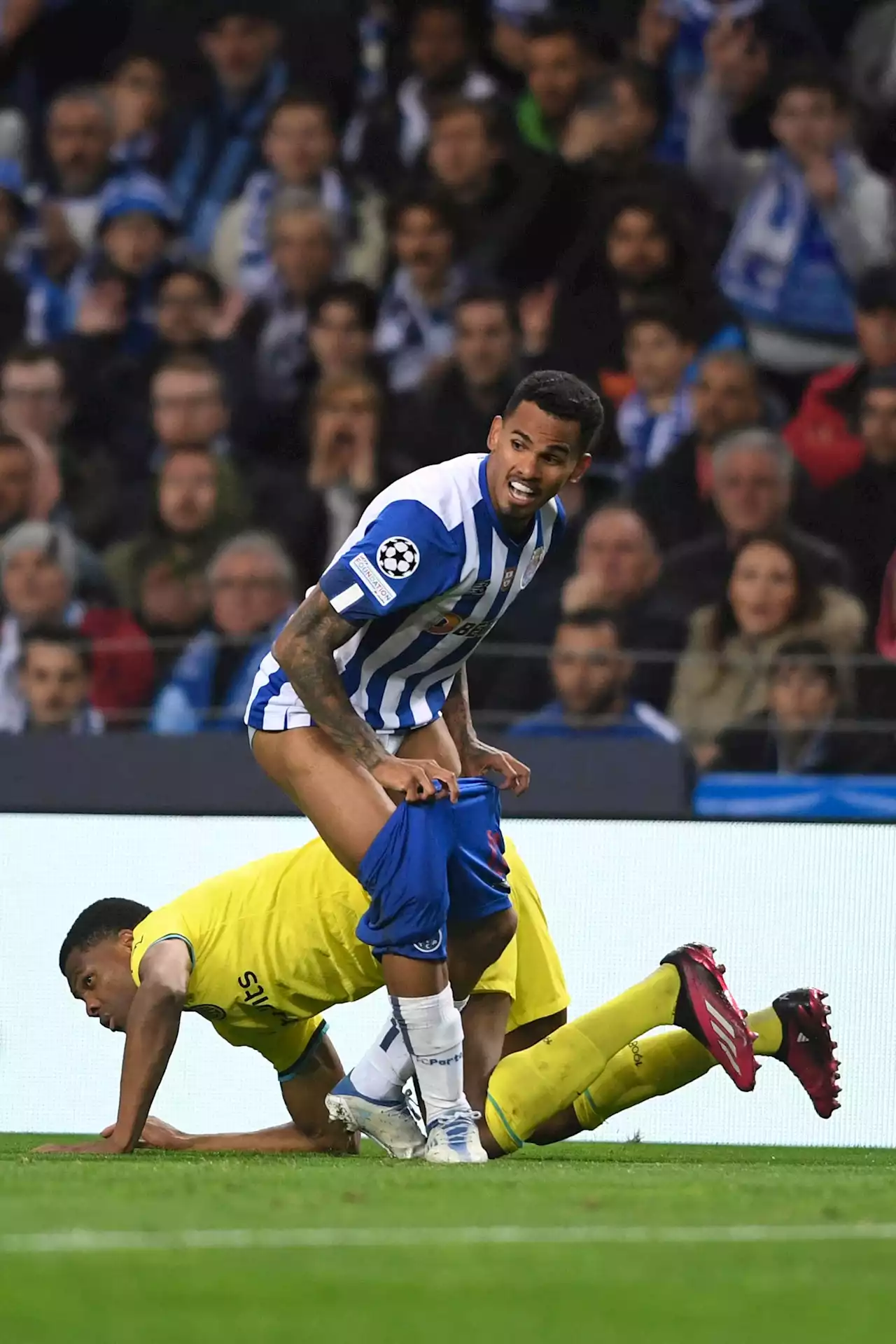 Porto star left red-faced after his shorts are pulled down by Inter man Dumfries