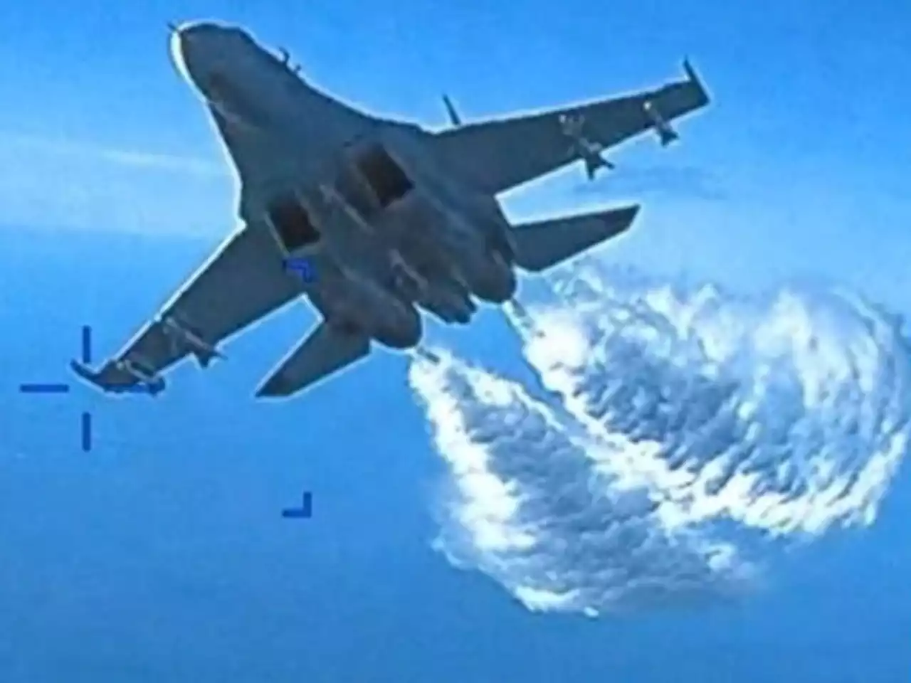 Watch As A Russian Jet Dumps Its Fuel On A US Drone [Video]