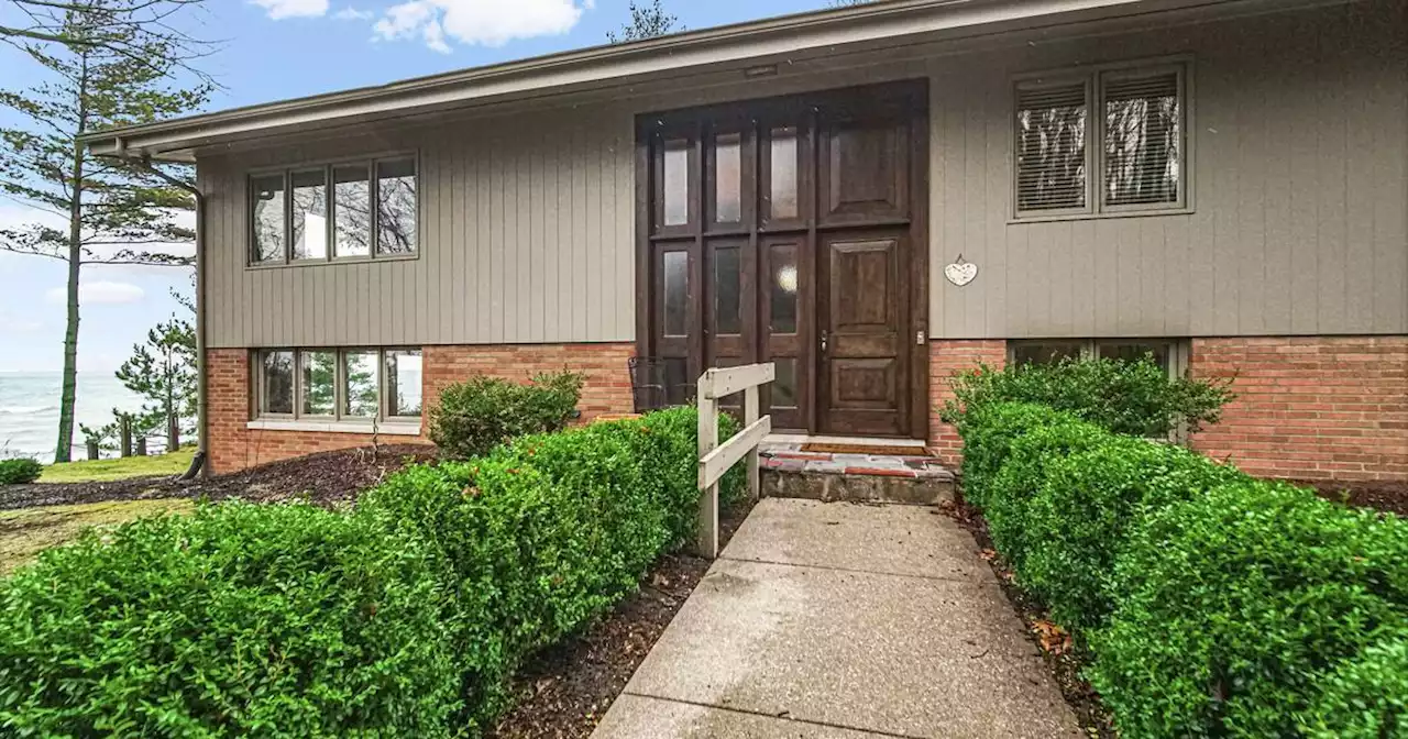 Dune Acres 4-bedroom home with screened-in porch: $2.8M