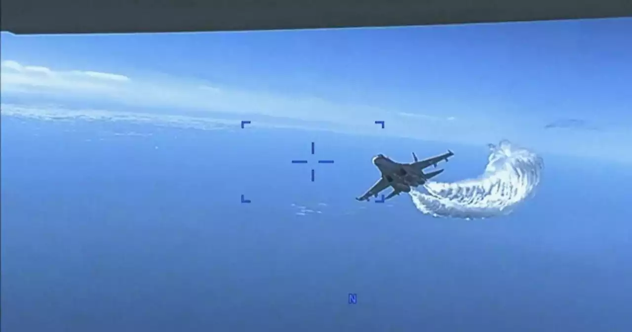 U.S. releases video of Russian fighter jet dumping fuel on American spy drone