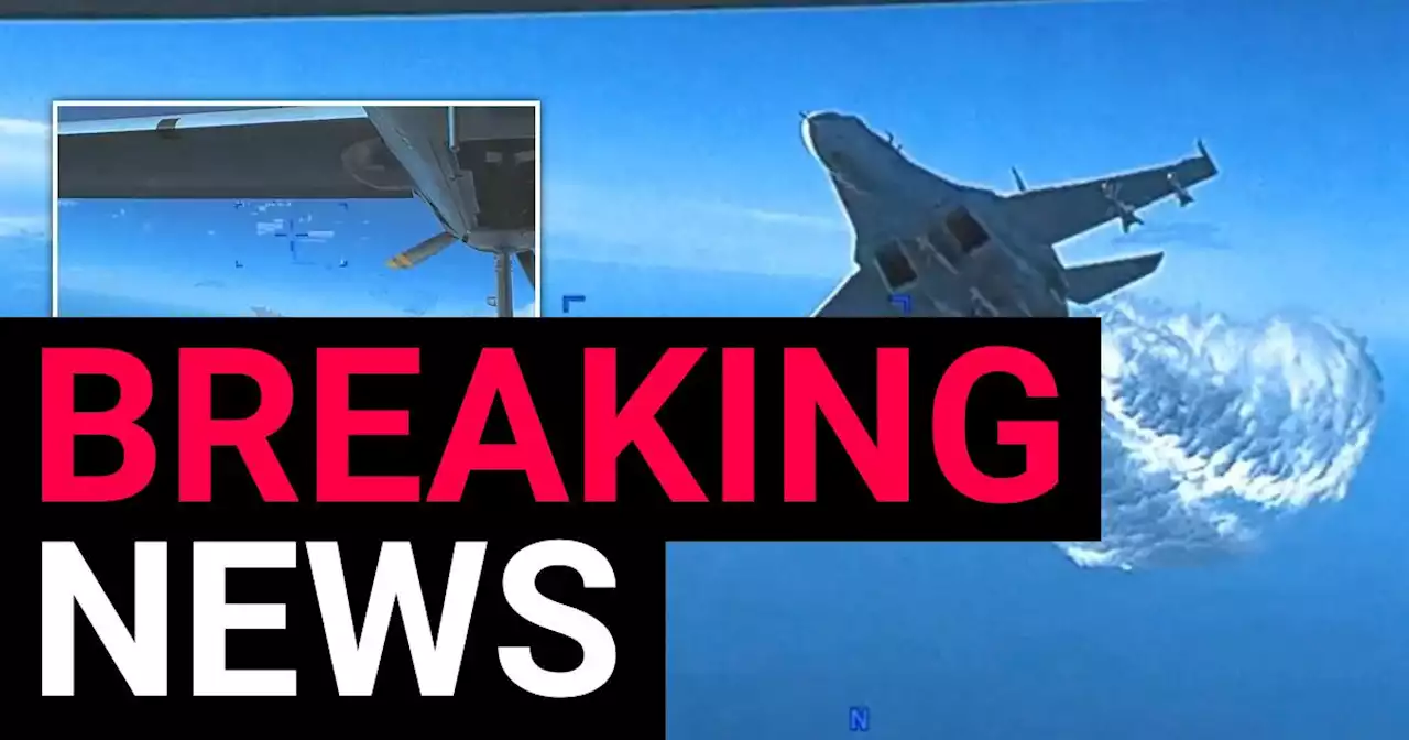 Moment Russian jet dumps fuel close to downed US drone released by Pentagon