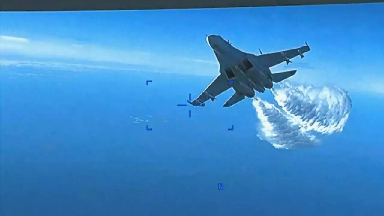 U.S. releases video of Russian jet dumping fuel on its drone