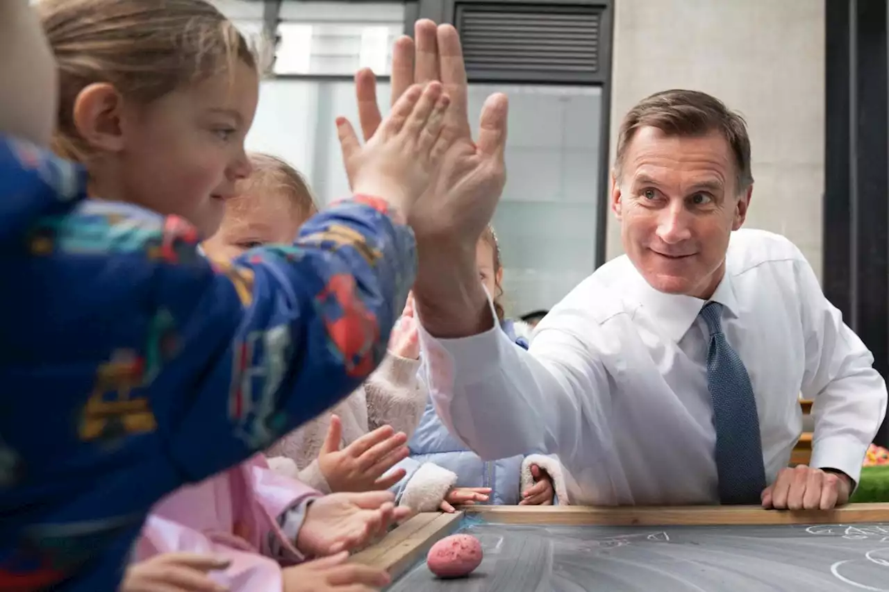 Hunt says 'we're going as fast as we can' after criticism free childcare won't begin until 2025