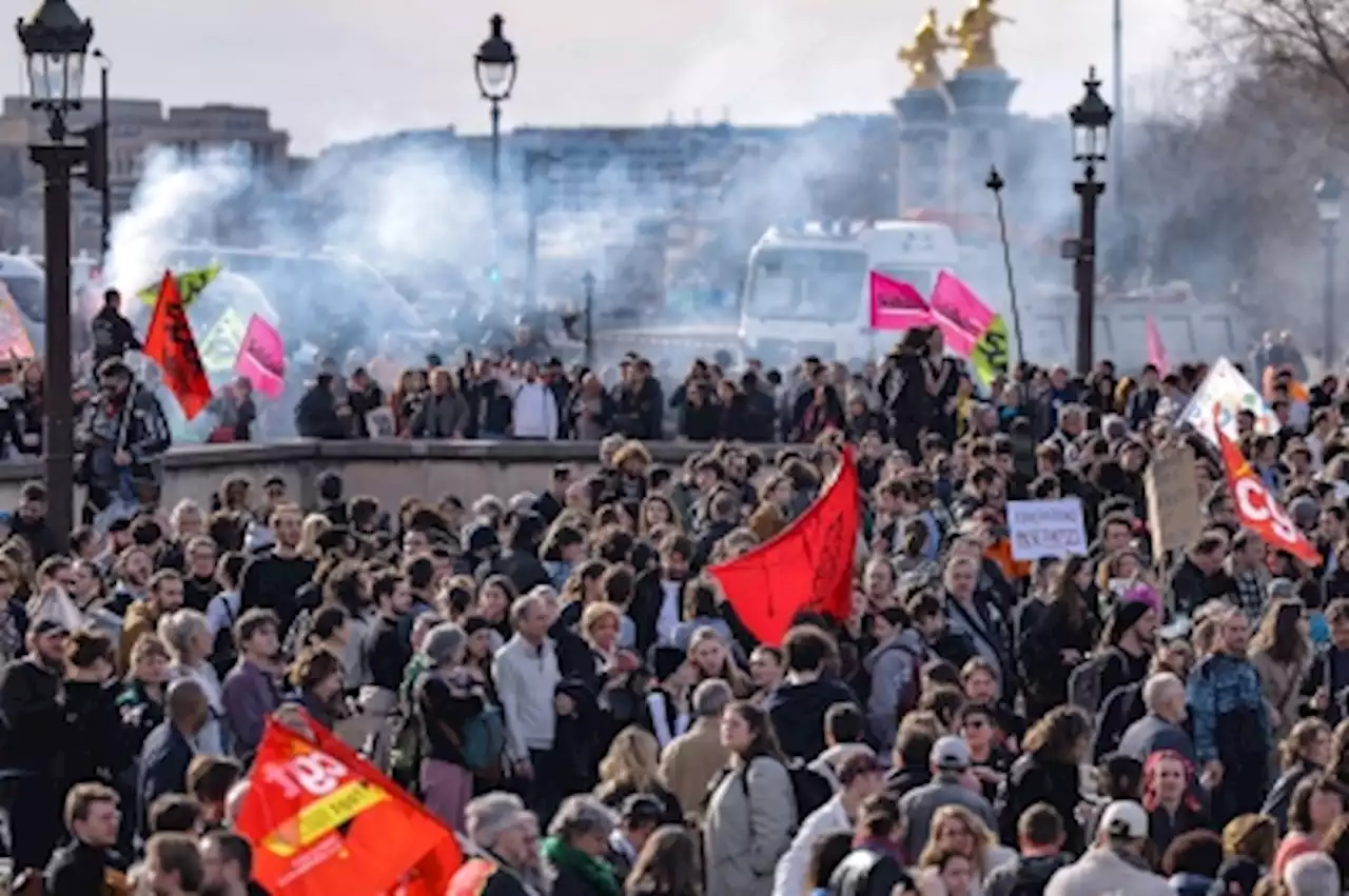 Protests rock France after Macron rams through pension reform