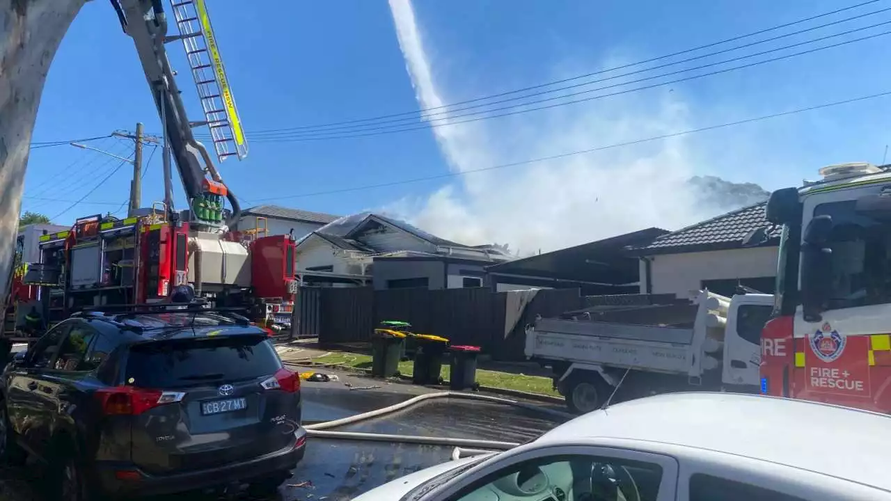 Fire destroys home in Sydney's south-west as school evacuated