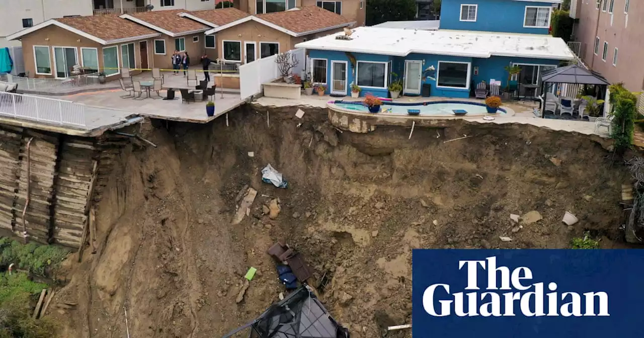 Oceanfront homes crumble in California as torrential rains lead to landslides