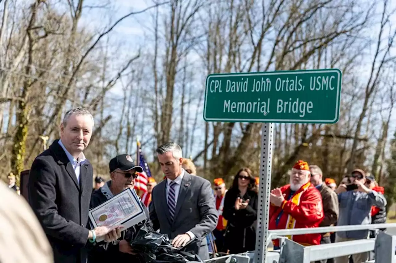 In Bucks County, people gather to honor a son who died in Vietnam, naming a bridge in his honor