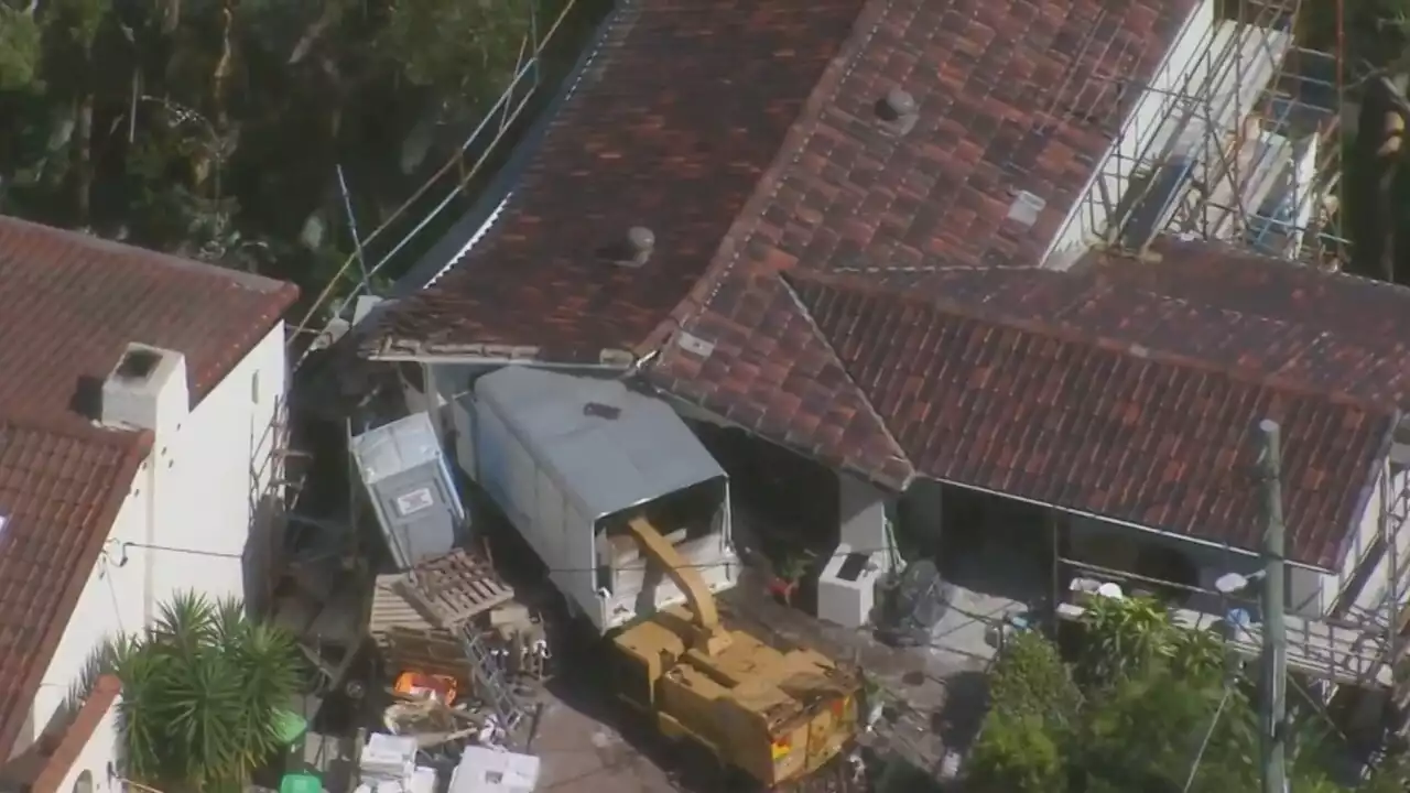 Truck crashes into garage of multi-million dollar Sydney home