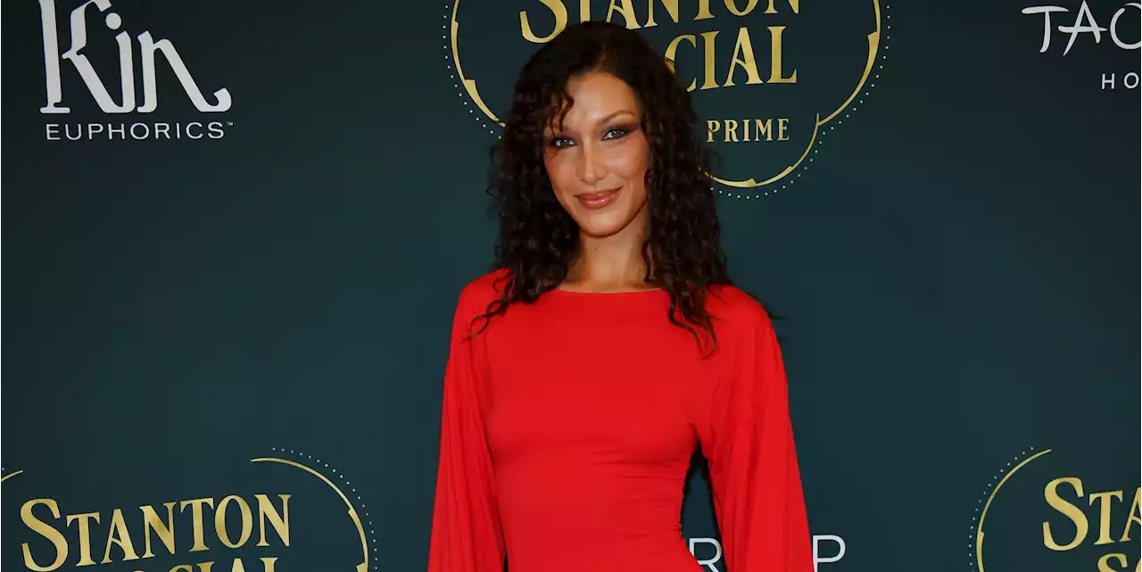 Bella Hadid Is Striking in a Red Drop-Waist Dress and Curly Hair