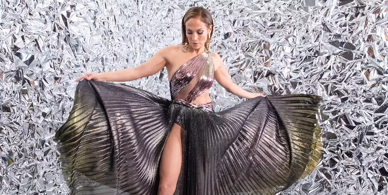 Jennifer Lopez Parties in a Metallic Cutout Gown with an Extreme Slit