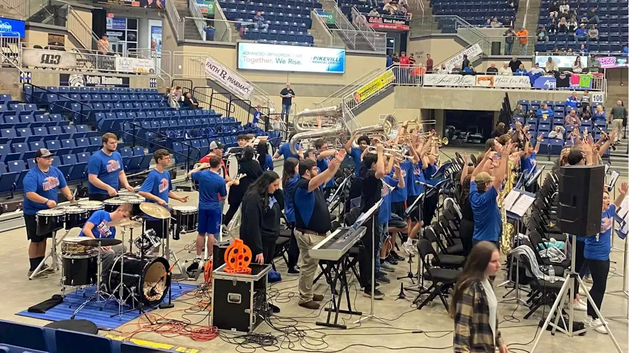 Rival high school steps in for missing basketball team’s band