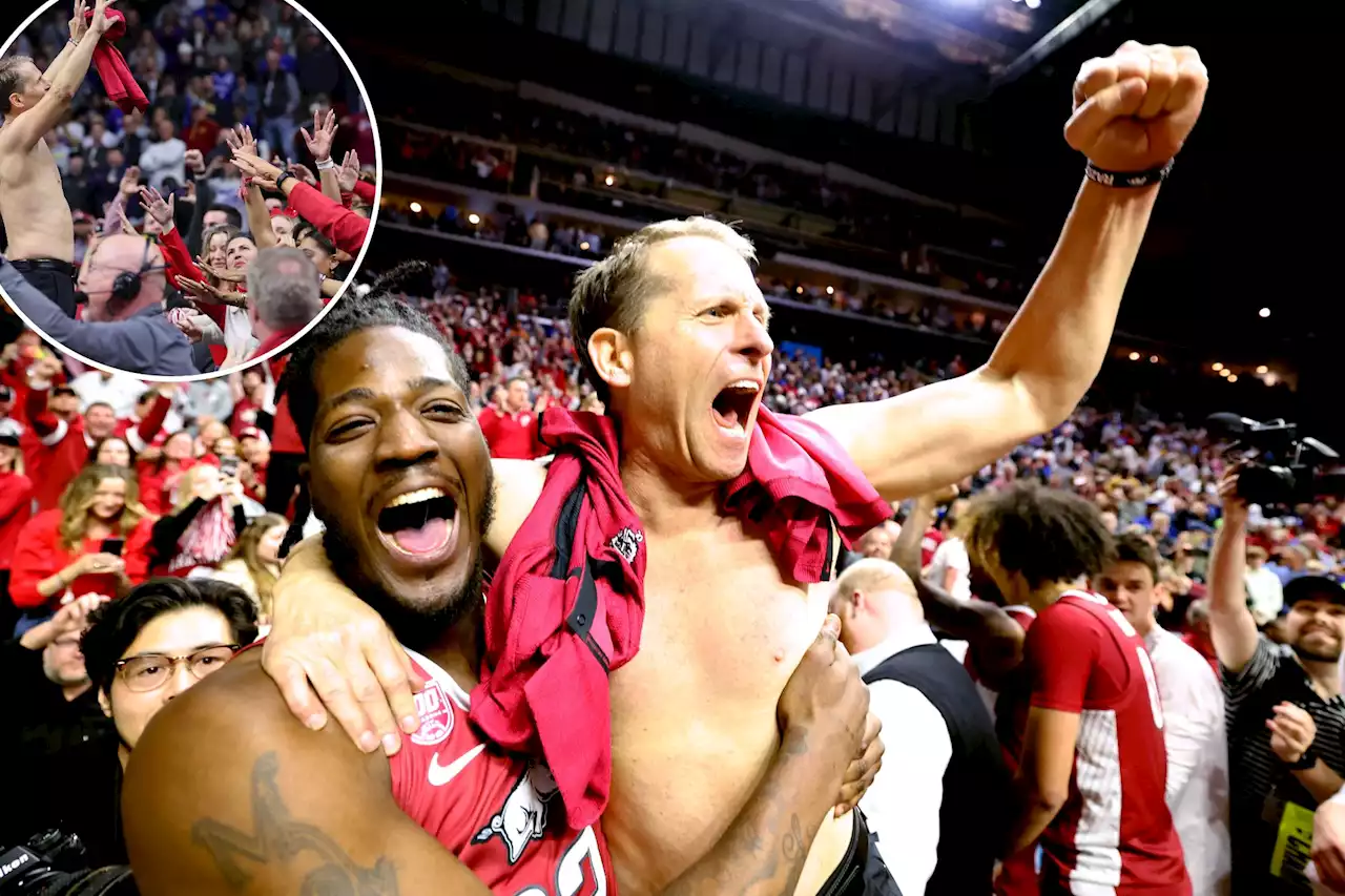 Arkansas’ Eric Musselman whips off shirt following upset win over Kansas