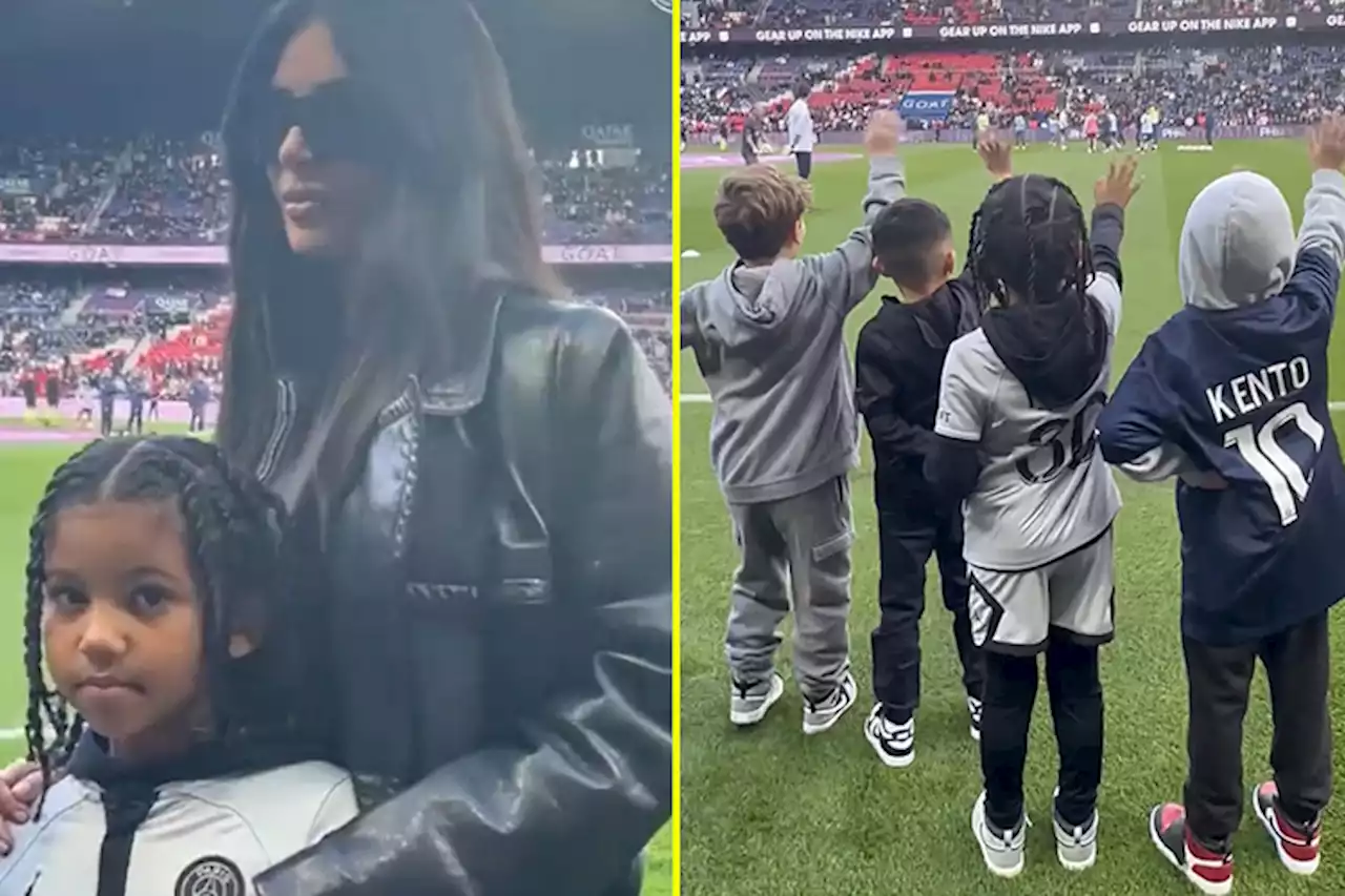 Lionel Messi waves at Kim Kardashian's son as they attend PSG clash after Arsenal loss