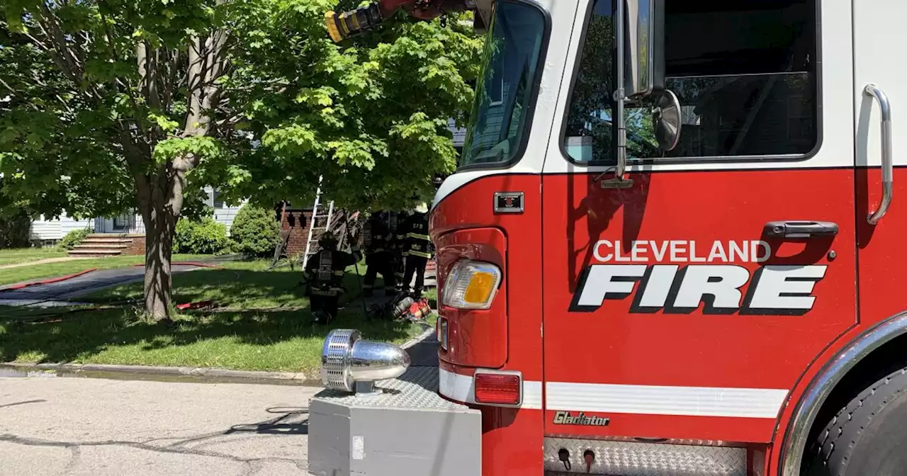 Man rescues elderly neighbor from house fire on W. 44th St.