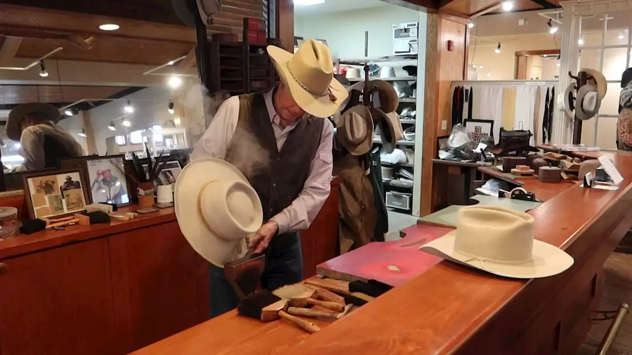 Shudde Brothers Hatters fitting hats the same way for 115 years