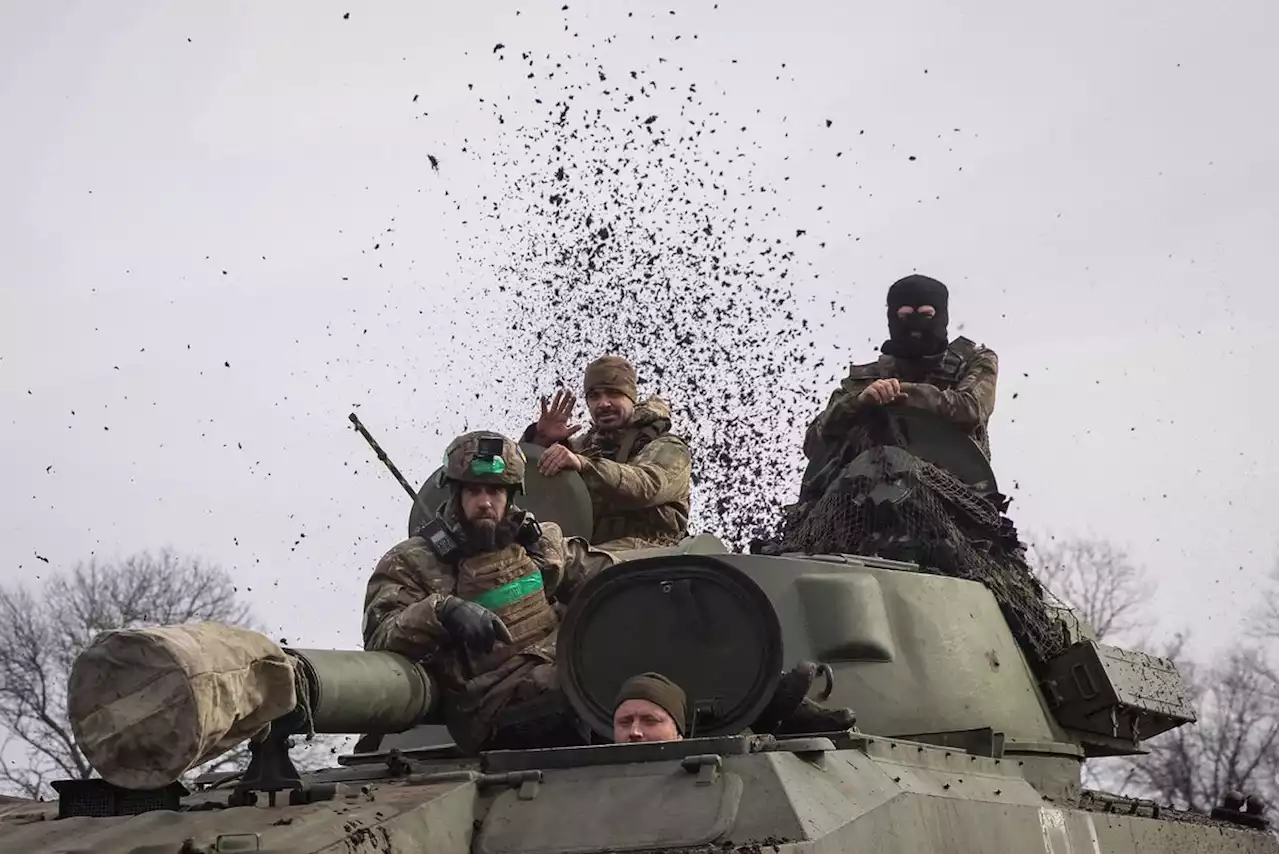 Ukraine clings to Bakhmut as Russian missiles kill civilians in south