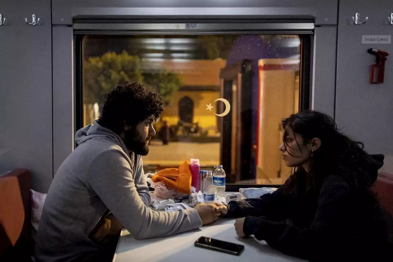 IN PHOTOS: Turkish families shelter on a train after earthquake brought life to a standstill