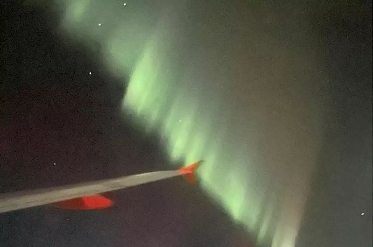 Pilot performs mid-flight maneuver to give passengers a rare view of the northern lights