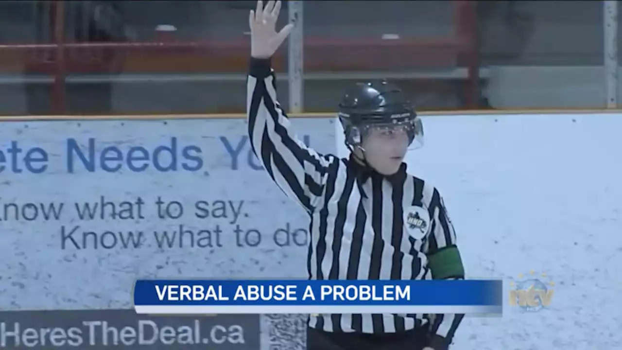 Young hockey officials wear green armbands to deal with harassment