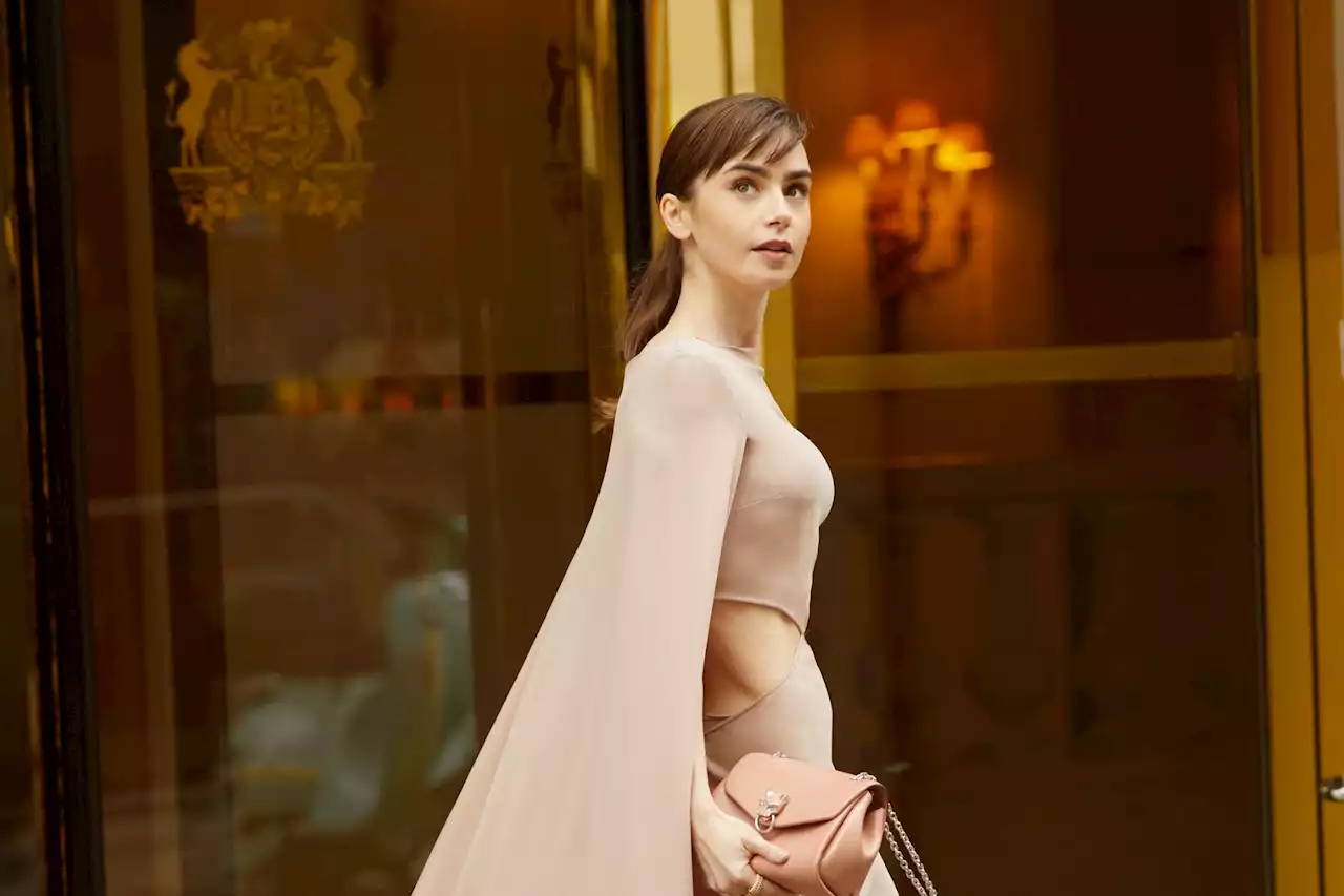 Emily In Paris star Lily Collins, 33, wows in cut-away gown and cape