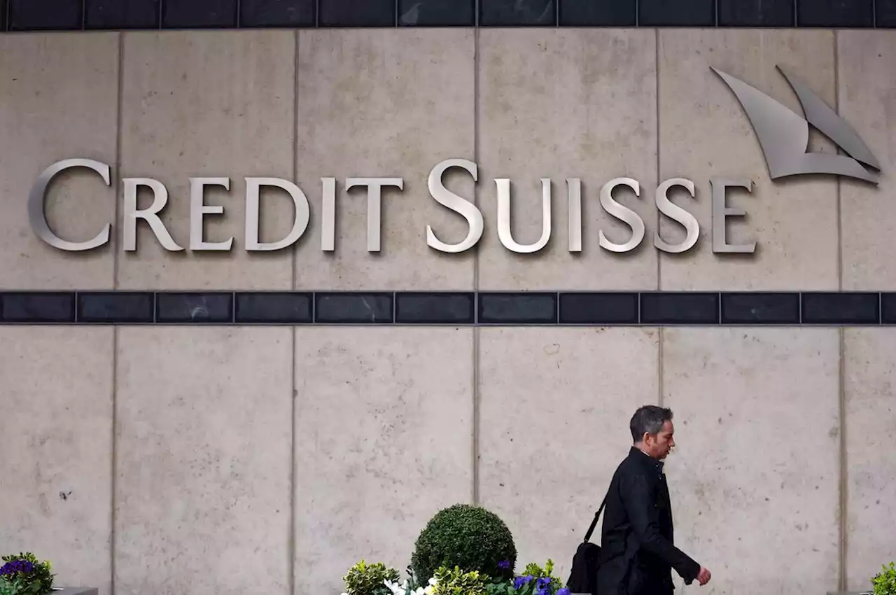 Stunned Credit Suisse staff fear uncertain future despite UBS rescue deal