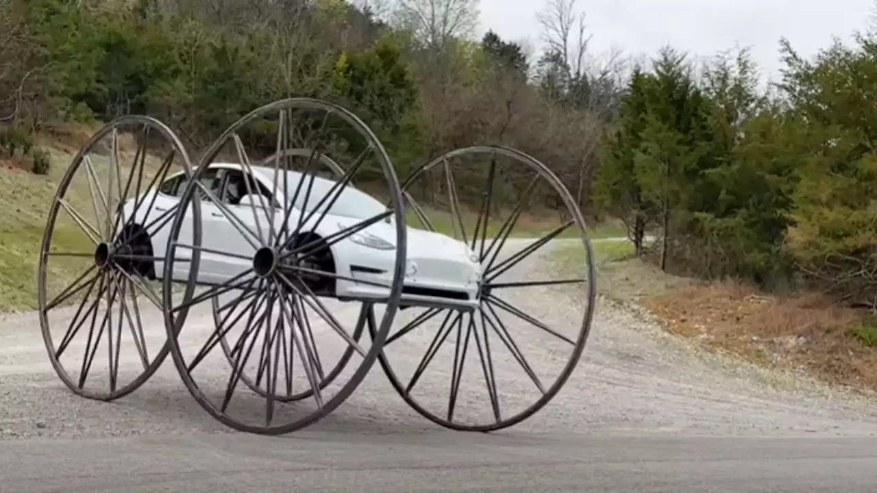 Watch: YouTuber modifies a Tesla Model 3 with 10-feet wide wheels