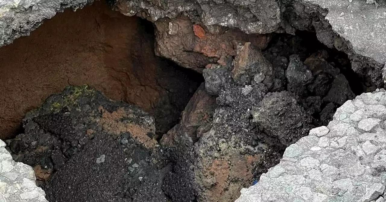 Large sinkhole closes road as drivers warned to avoid area