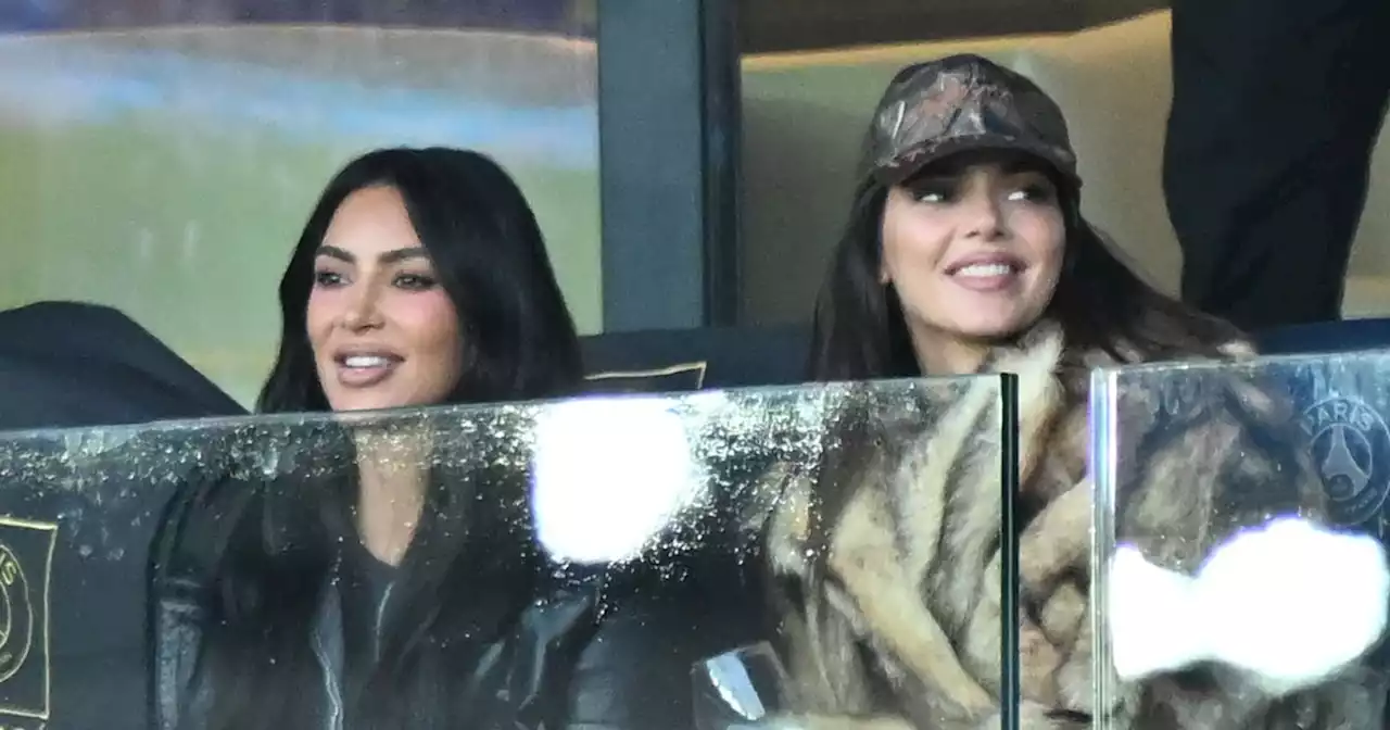 Kim Kardashian and Kendall Jenner sip wine as they watch football match in Paris