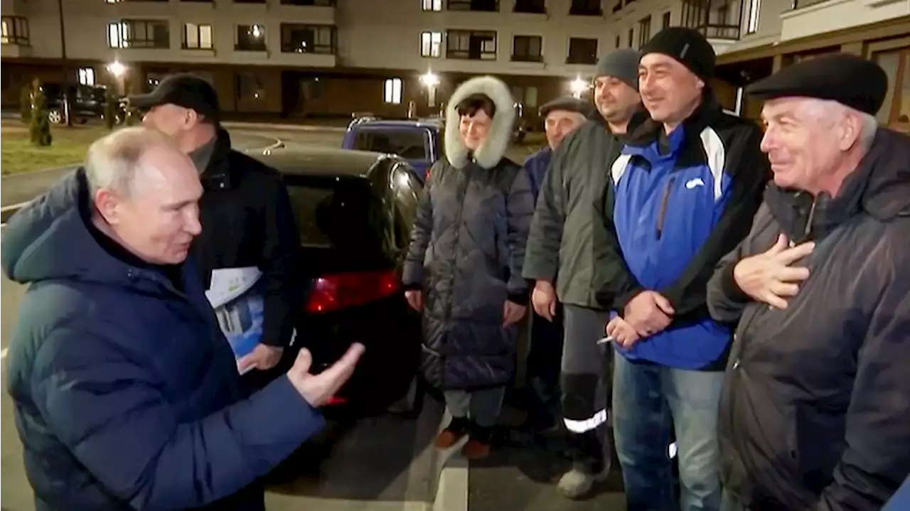 Putin makes a surprise visit to Mariupol and tours an occupied city destroyed by war