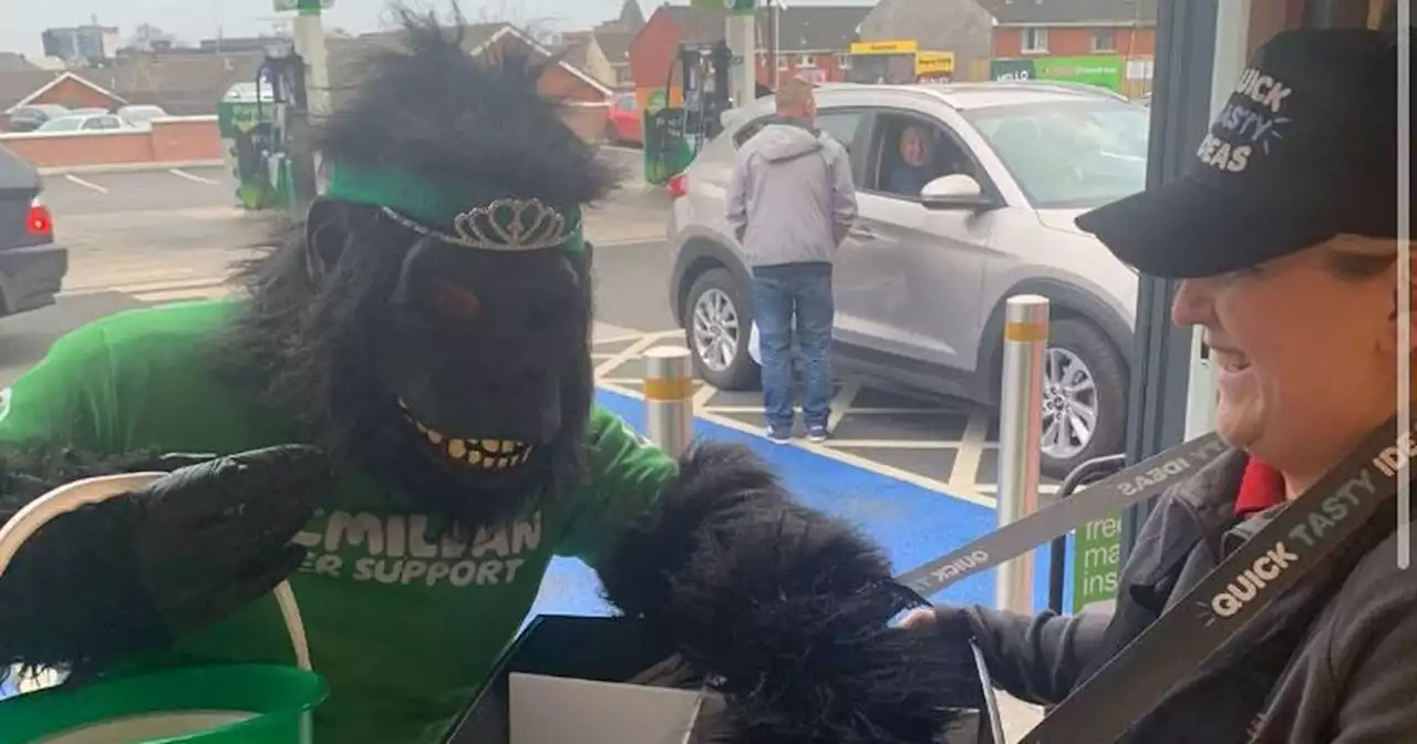 East Belfast fancy dress fundraiser tops London half marathon donation table