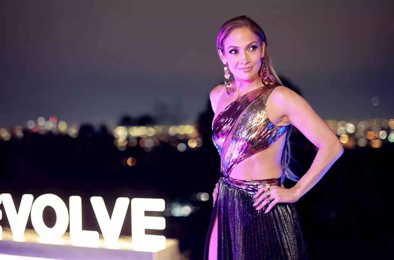 Jennifer Lopez Dazzles in Disco-Ready Metallic Gown With Thigh-High Slit