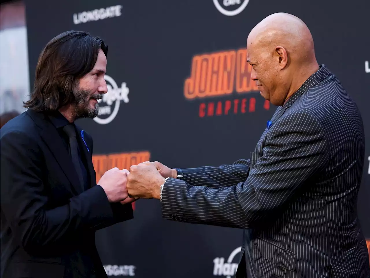 'STILL IN SHOCK': John Wick stars honour 'our brother' Lance Reddick at premiere