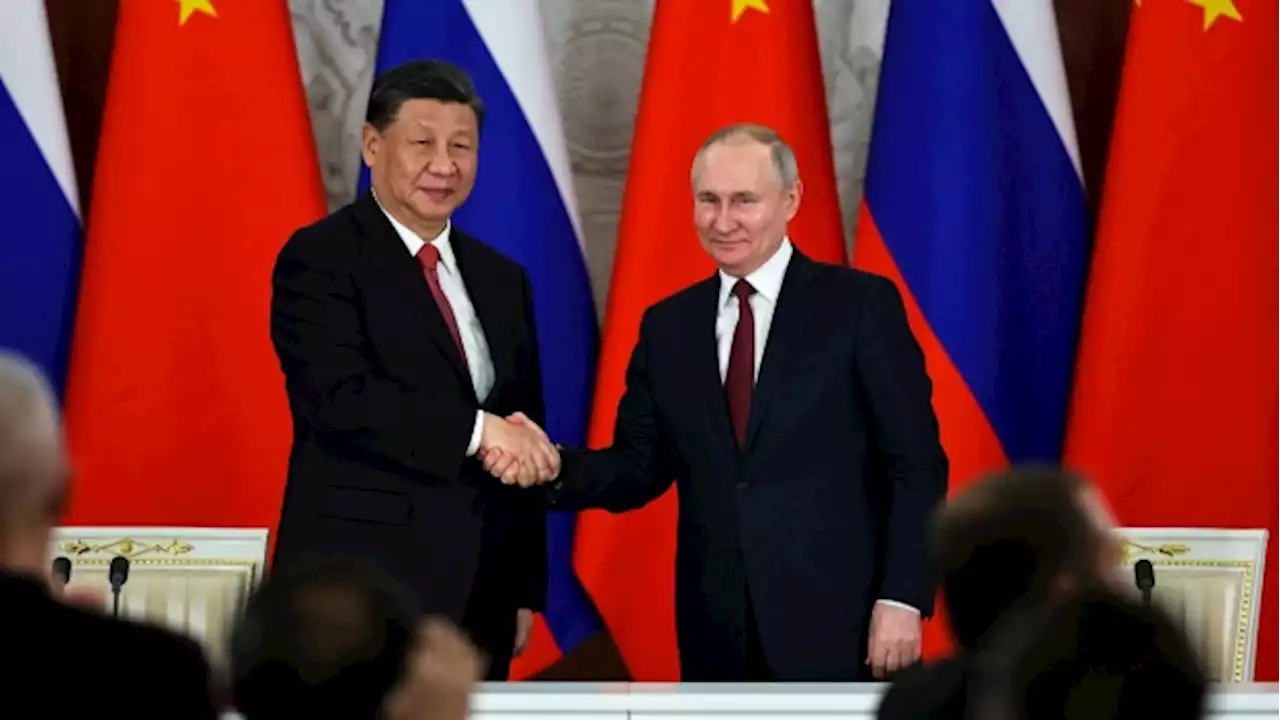 Putin hosts Xi in the Kremlin with imperial palace pageantry