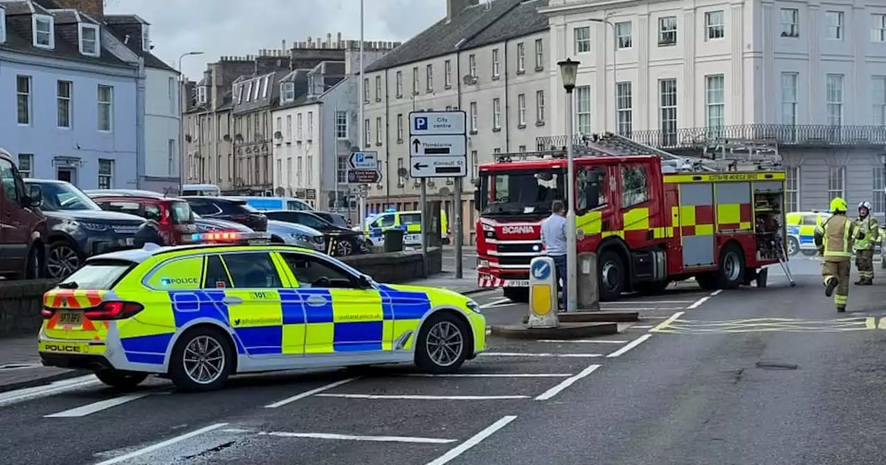 Car blaze sends smoke billowing into sky as cops lock down busy Scots road