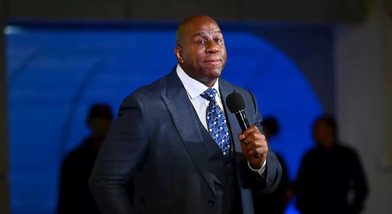 Magic Johnson joins Josh Harris's group for Commanders bid: reports